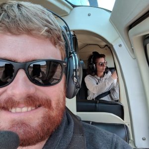 a Couple in a helicopter as it flies over the Grand Canyon