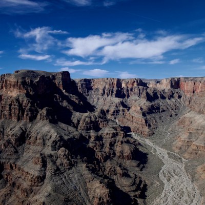 a canyon with a mountain in the background