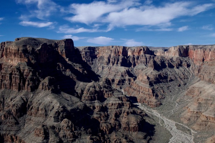a canyon with a mountain in the background