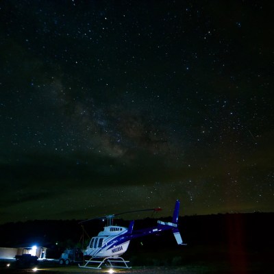 a plane flying in the night sky